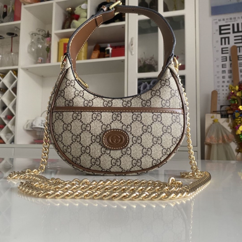 G*u*i top handle bags
